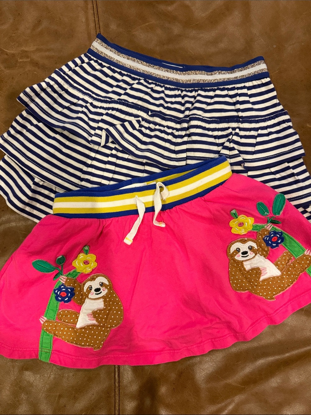 Mini Boden Girls' Bright Pink Sloth Appliqué Skirt + Navy Striped Skirt (2)